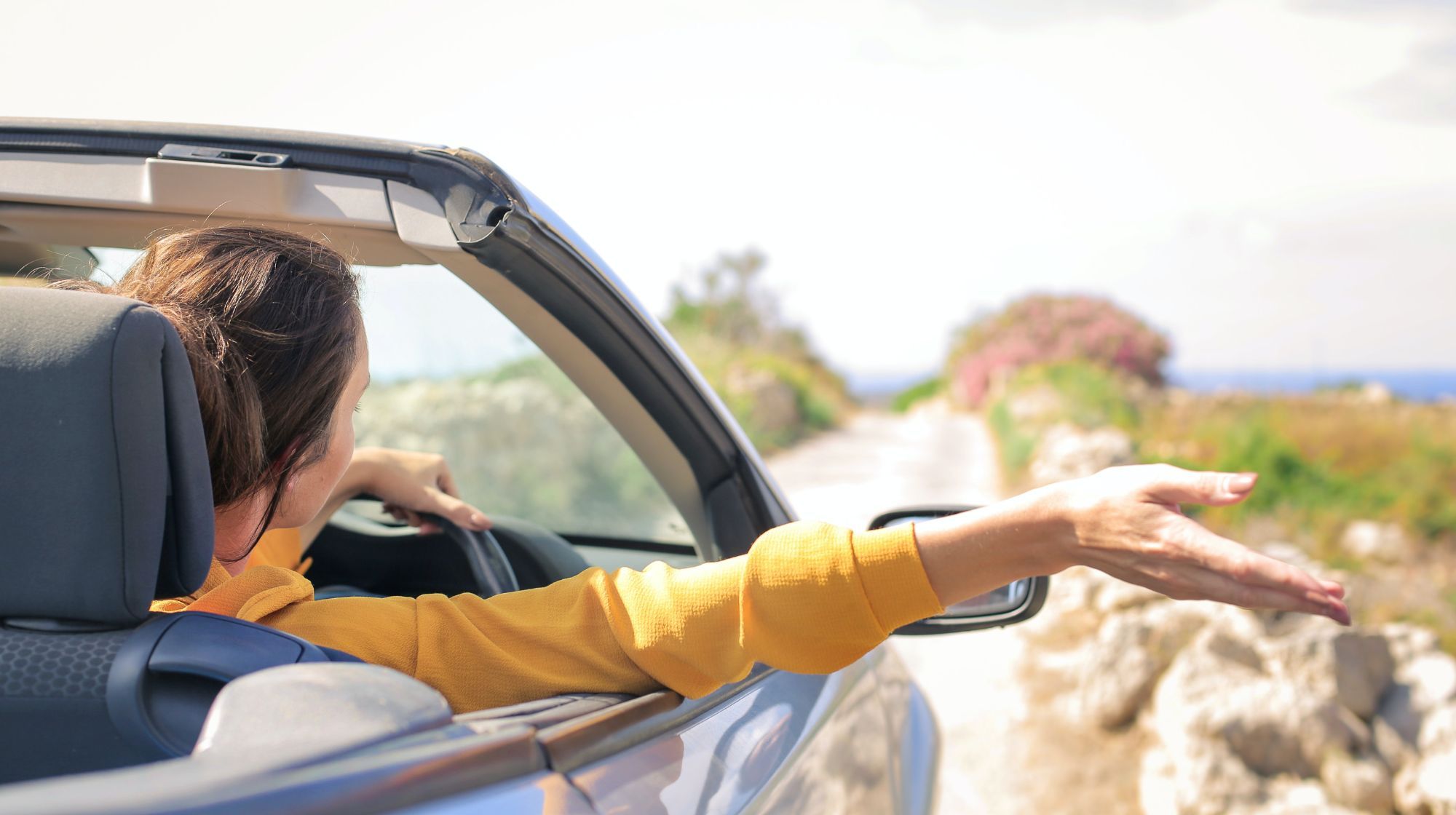 Conductora en su coche. / PEXELS