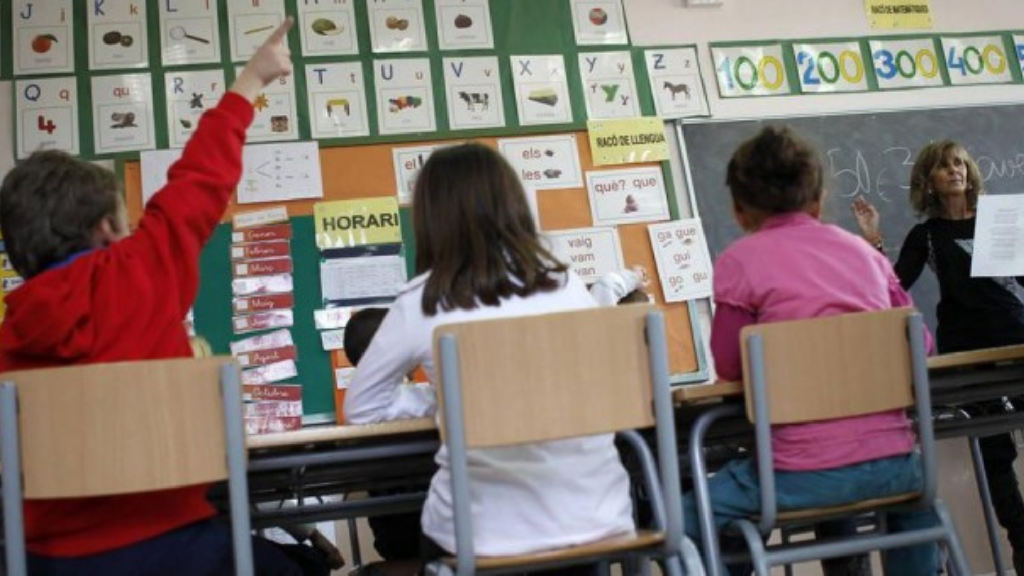 Niños en el colegio durante una clase. /Efe