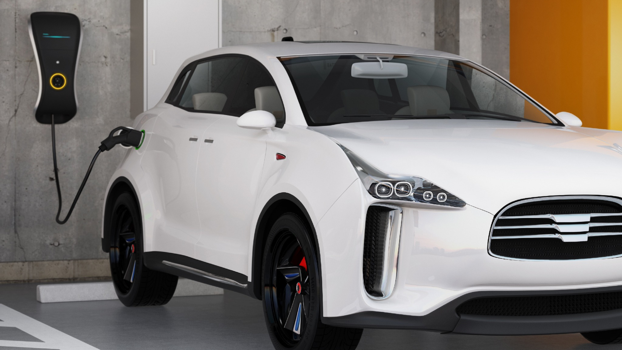 Imagen de un coche eléctrico cargándose. / IDAE