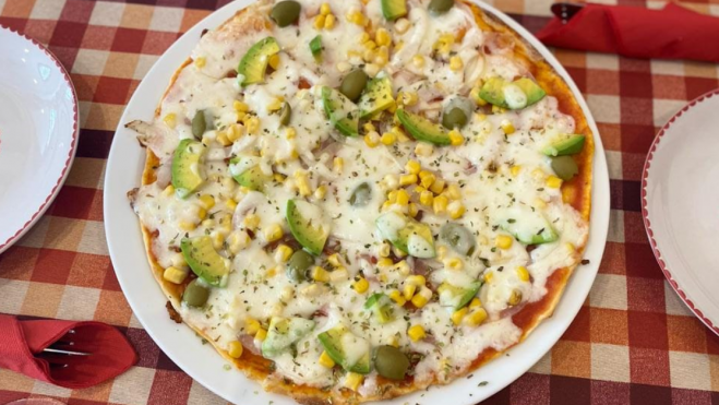 En el restaurante Pizza Gourmet de All'Italiana, además de pizzas, se degustan unas deliciosas lasañas. Eso sí, Manu, su dueña, nunca sirve pasta para cenar. CEDIDA En el restaurante Pizza Gourmet de All'Italiana, además de pizzas, se degustan unas deliciosas lasañas. Eso sí, Manu, su dueña, nunca sirve pasta para cenar. CEDIDA