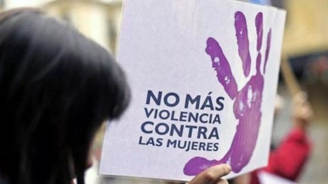 Cartel contra la violencia de género. / EFE