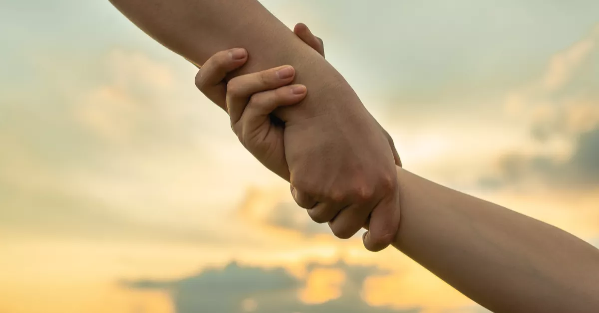 Dos manos tendidas / AH