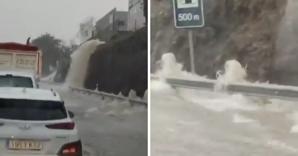 El agua revienta un muro en la GC-1 en El Goro (Telde) y cae a chorro sobre la autopista./ RRSS