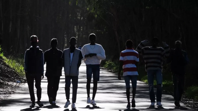 Grupo de jóvenes y menores migrantes|EFE