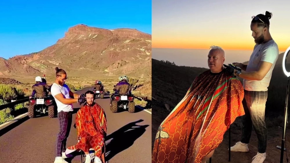 Un barbero belga corta a sus clientes el pelo en el Parque Nacional del Teide./ BELGIUM BARBER Un barbero belga corta a sus clientes el pelo en el Parque Nacional del Teide./ BELGIUM BARBER