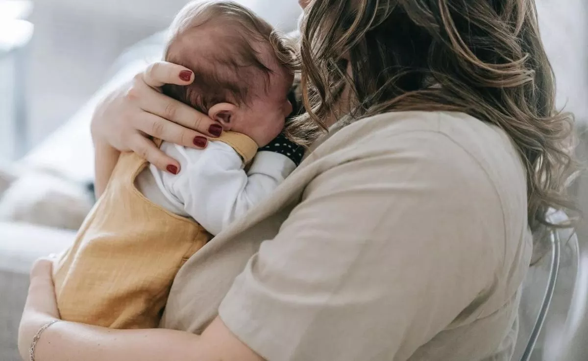 Madre con su bebé. /Archivo