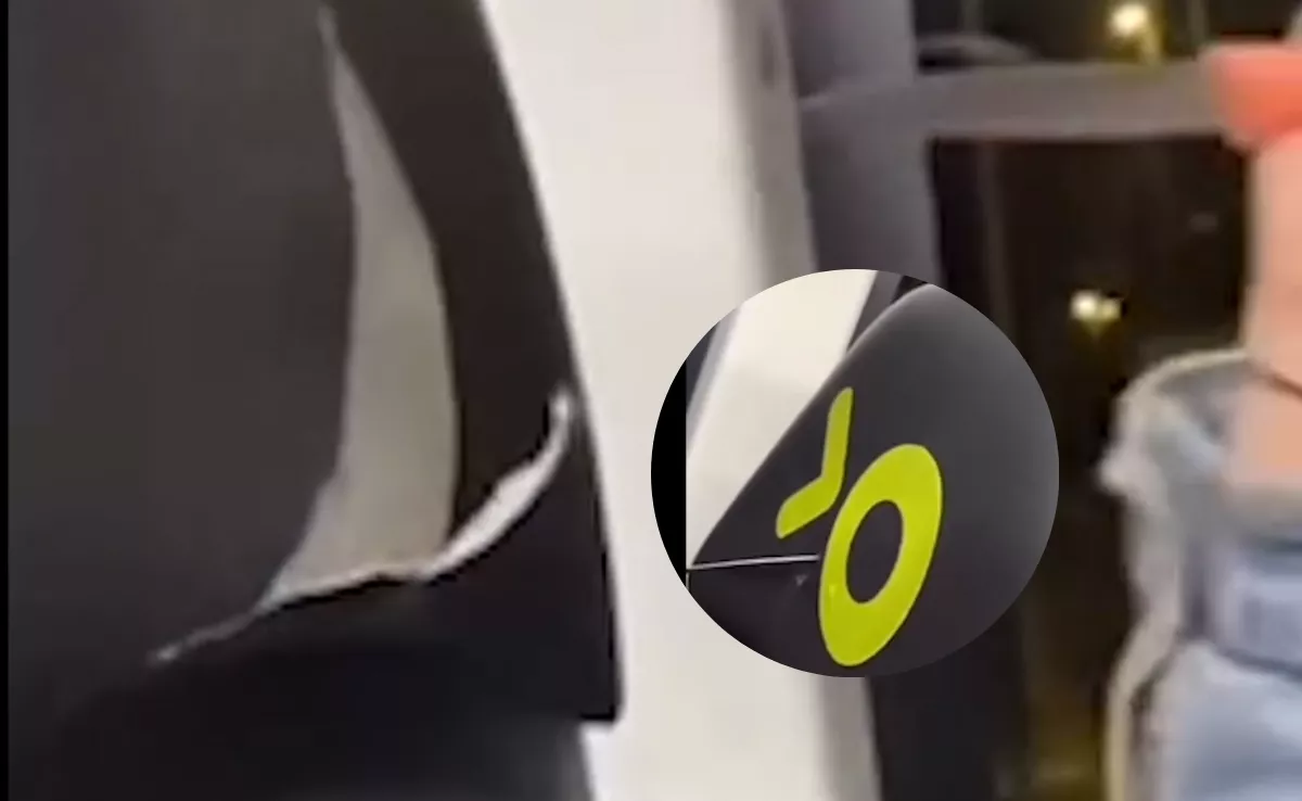 Una joven rompe con un cuchillo el reposacabezas de una guagua de Titsa en Tenerife. / REDES