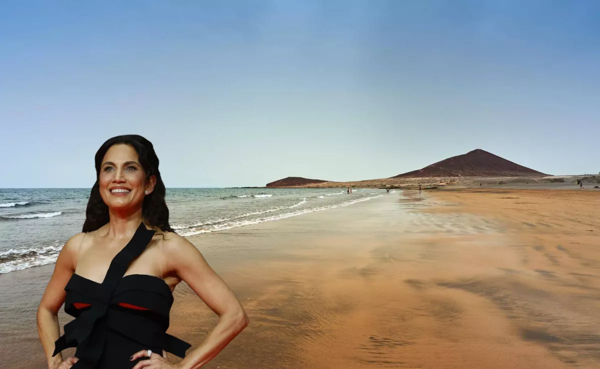 Imagen de Toni Acosta y la playa de El Médano / AH - EFE