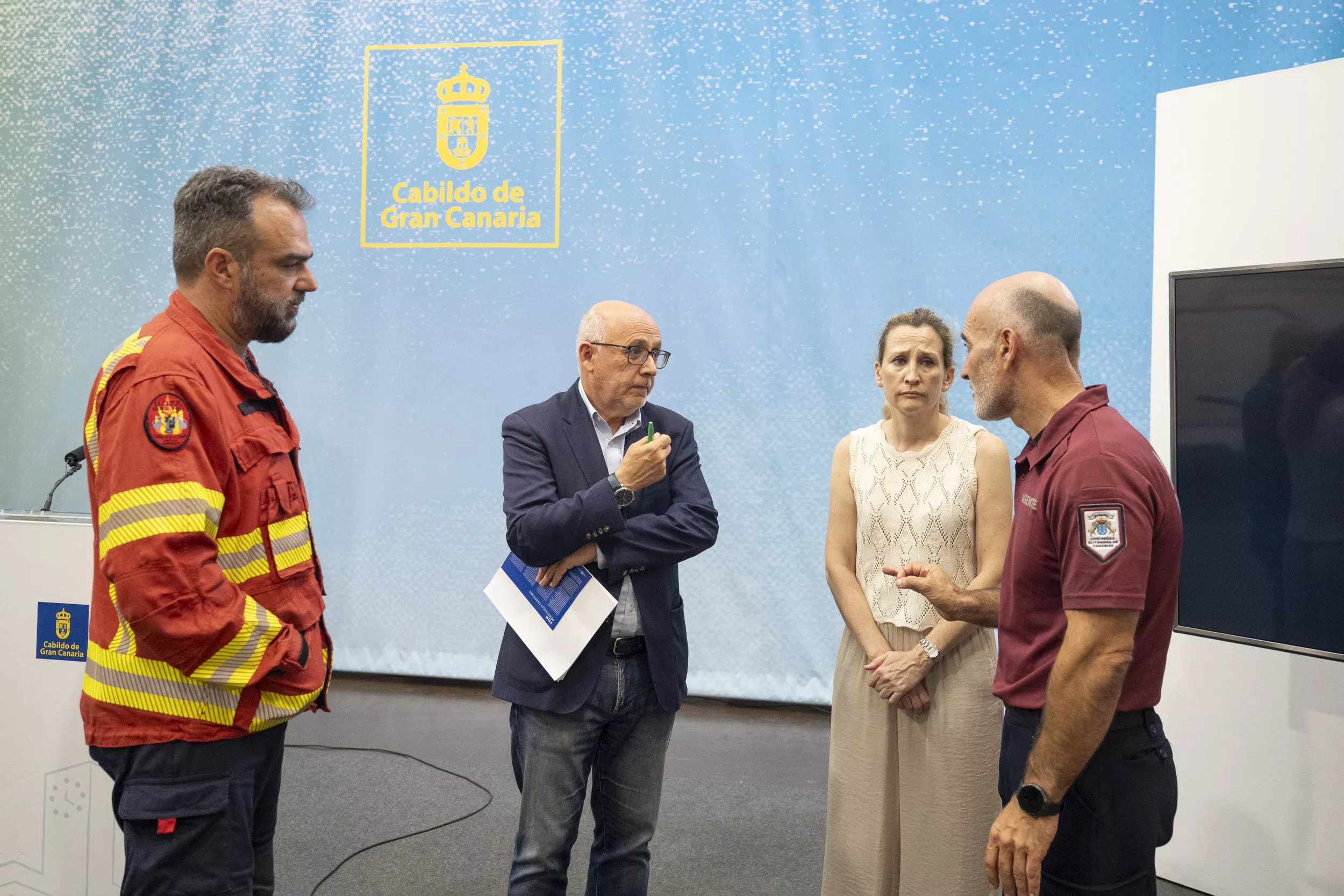 El presidente conversa con Grillo, Matilla y Santana. AH